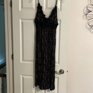 High-waist romper! Cute, thick lace band. Super flowy.